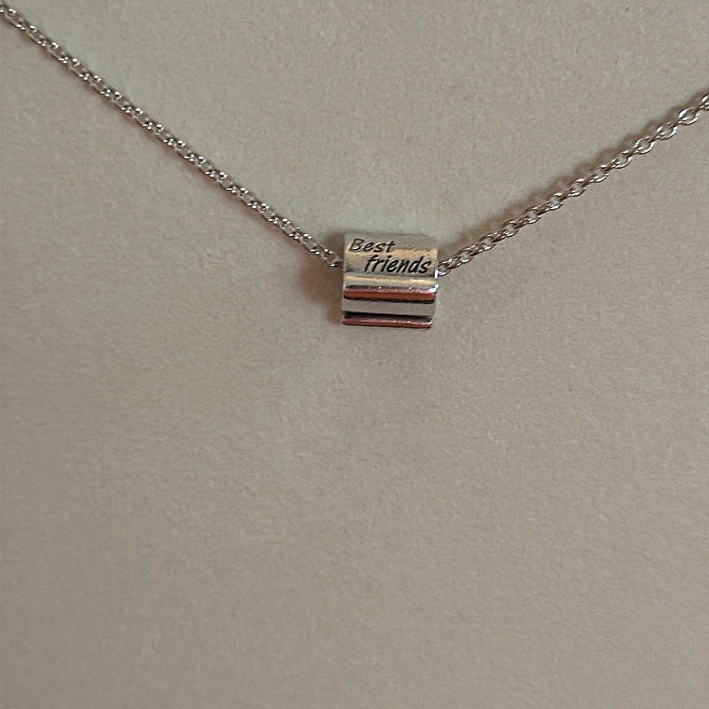 Pandora silver “Best Friends” charm.